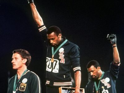 Smith and Carlos doing the Black power salute at the 1968 olympics